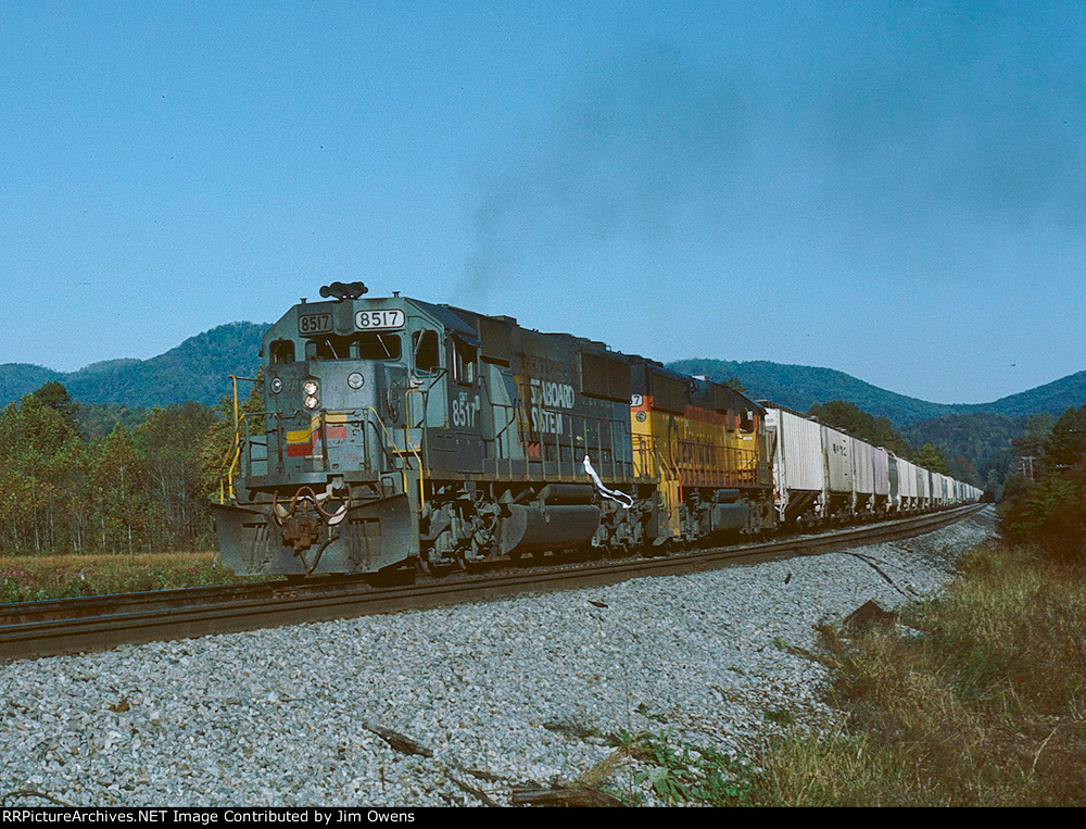 A southbound grain train pulling out of Thermal Siding after meeting a northbound.