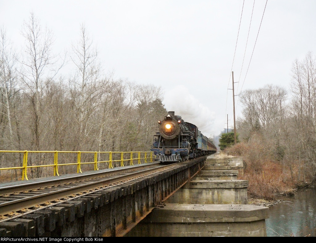 The 3:00 p.m. train crosses the Little Schuylkill in the fading light