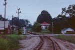 This view is the old P&N leaving downtown Greenwood. Just beyond the street crossing was a small yard and a wye.