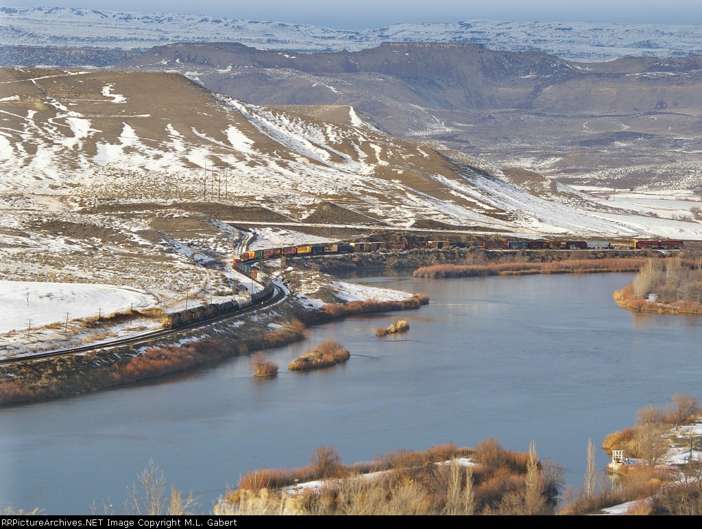 A westbound slowly makes its way along the Snake River.