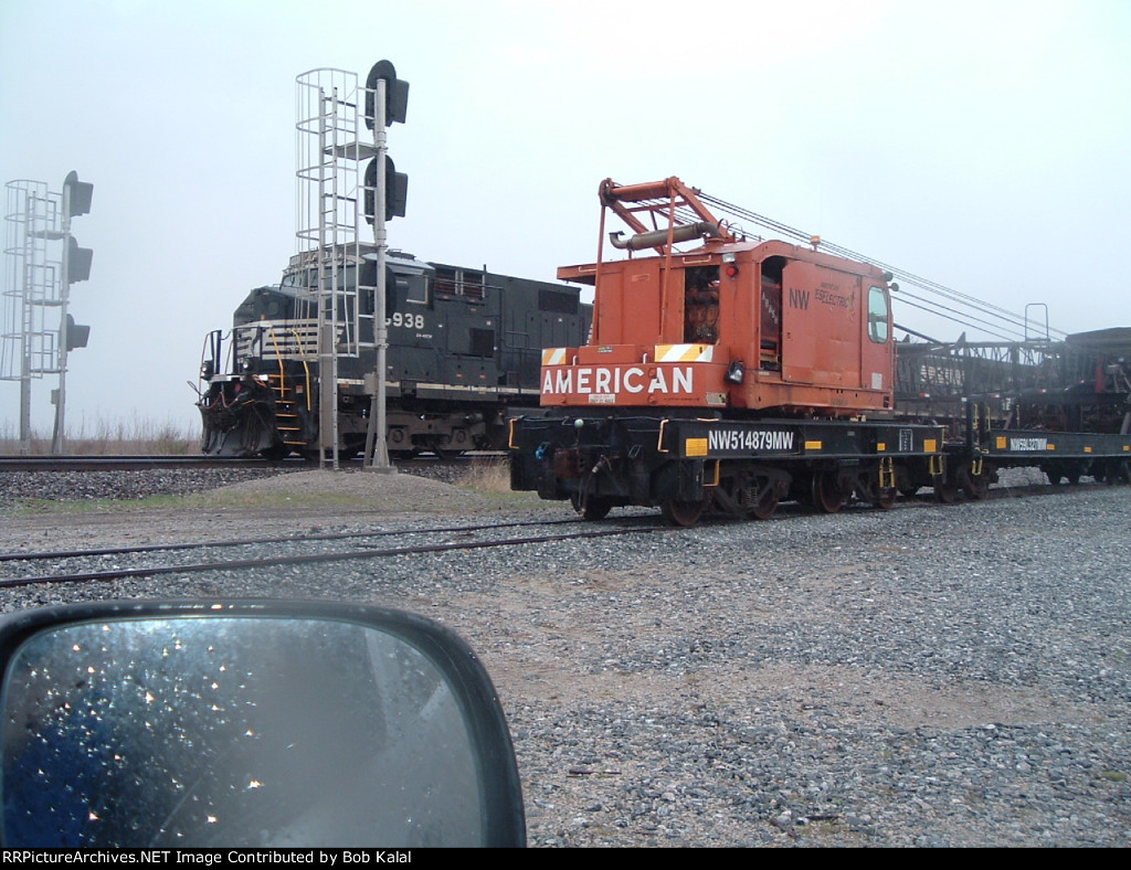 Crane Car w-NS 8938 backing to cars  to head north