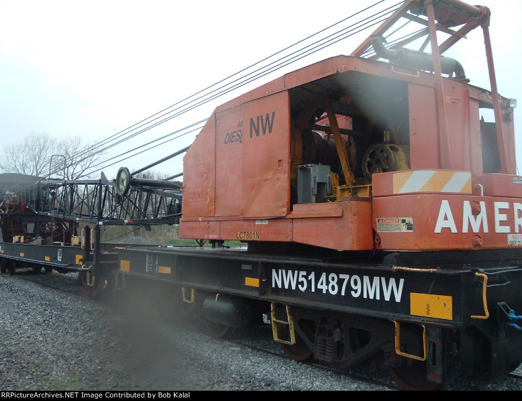 Crane Car w-NS 8938 backing to cars  to head north