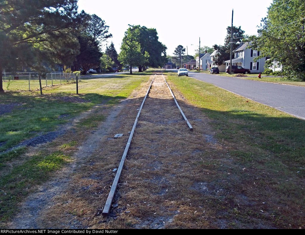 NE Railroad Ave as along of next by of abandoned tracks