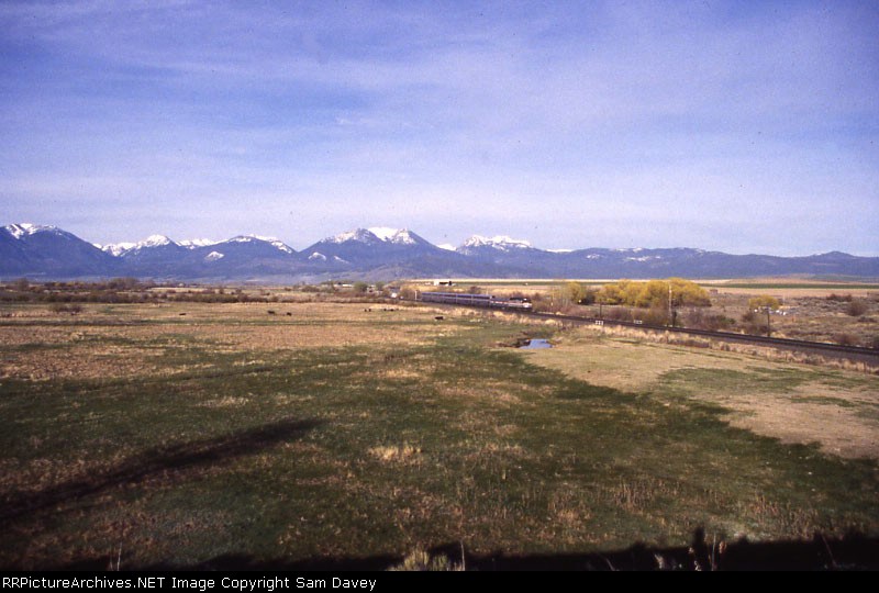 AmTrak Pioneer heading west with the Elkhorn Mountains in the background