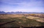 AmTrak Pioneer heading west with the Elkhorn Mountains in the background
