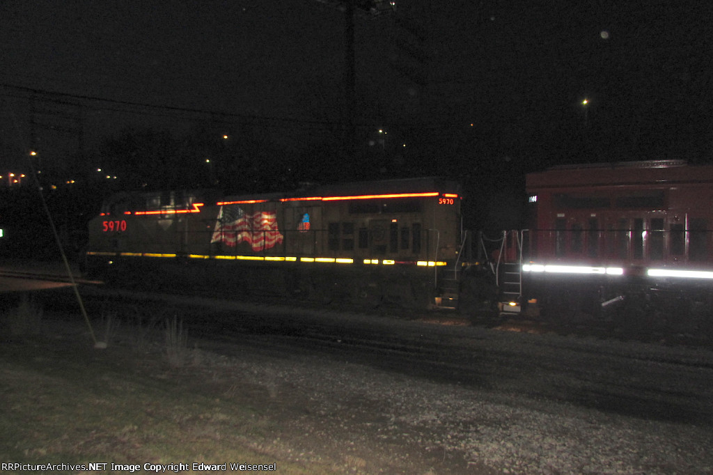 UP 5970 departing with 287 is electrified a half hour after sunset