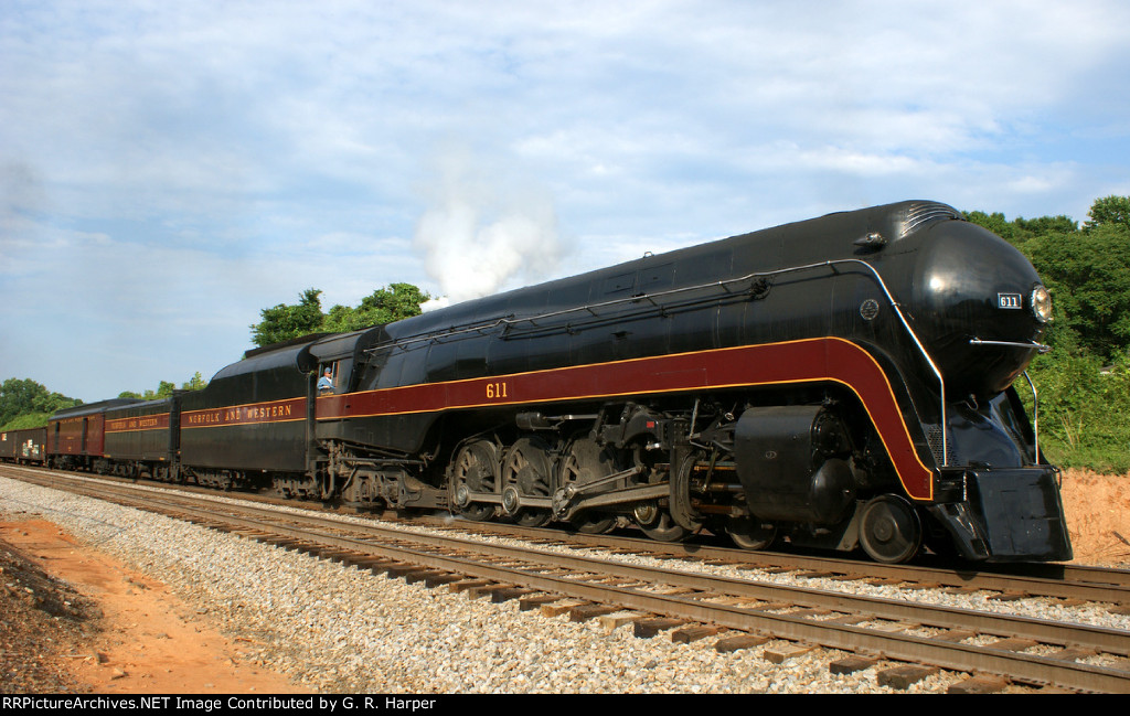 My best shot of the day, IMHO.  Low afternoon sun lights up 611's running gear as the train approaches Carroll Avenue