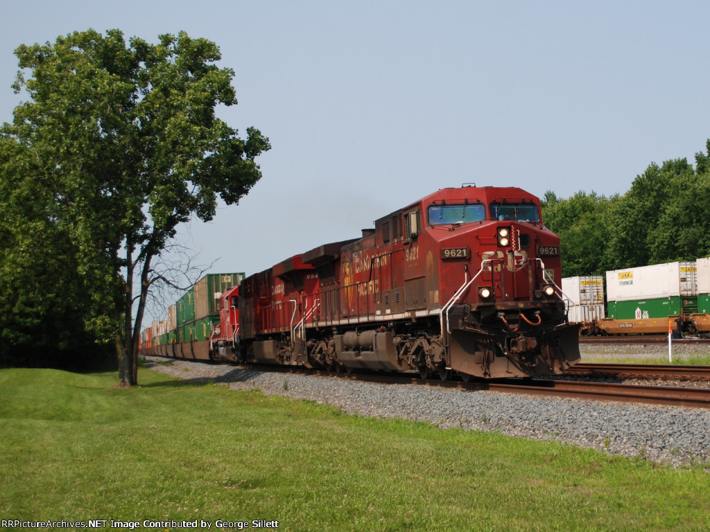 A trio of CP units speed east.
