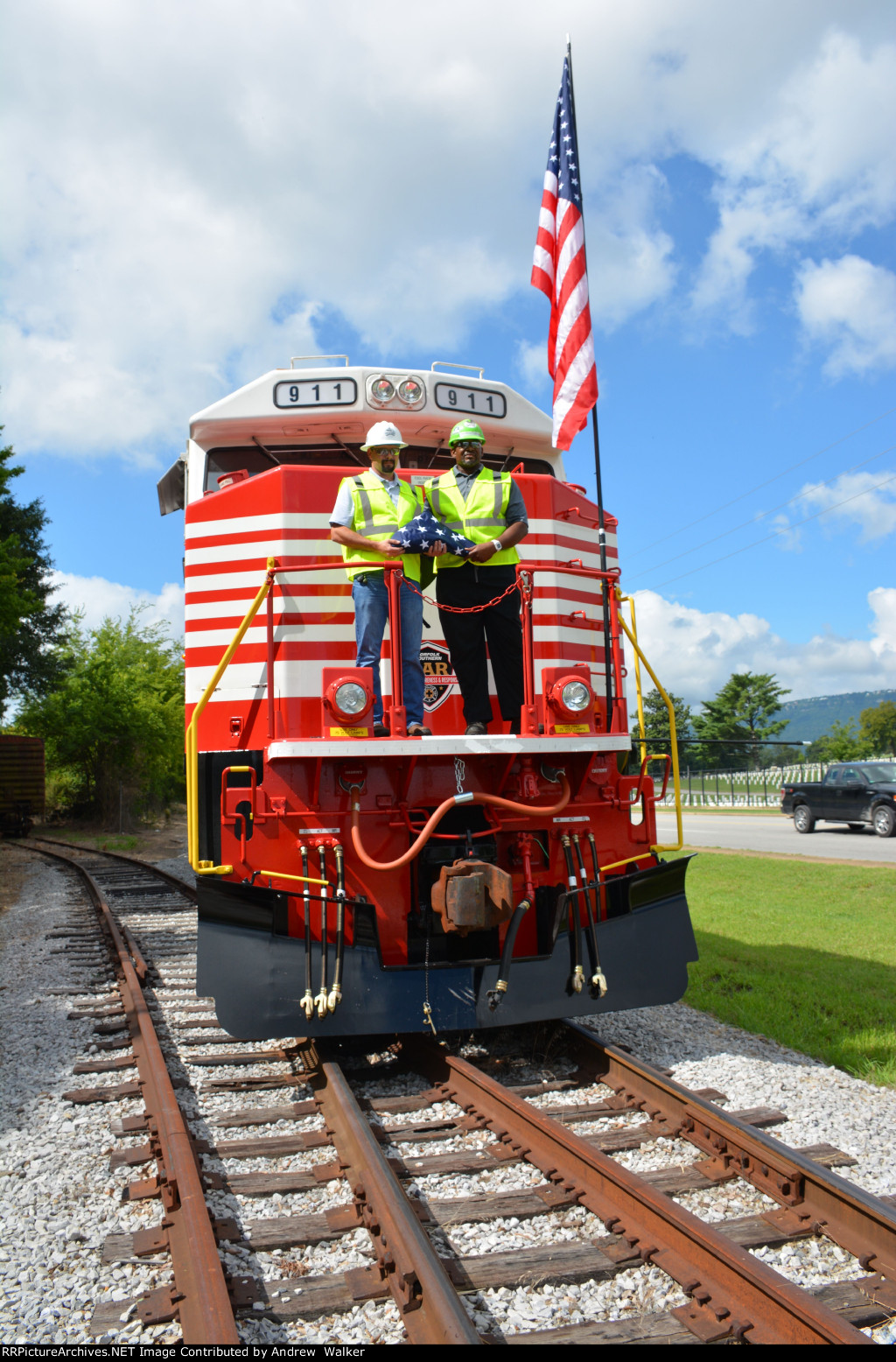 NS employees hold the American Flag on 911