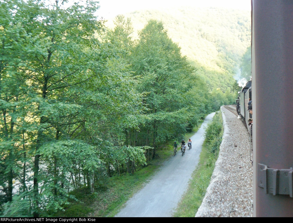 The 765 and its train looms over the bike trail at 4:19 p.m.