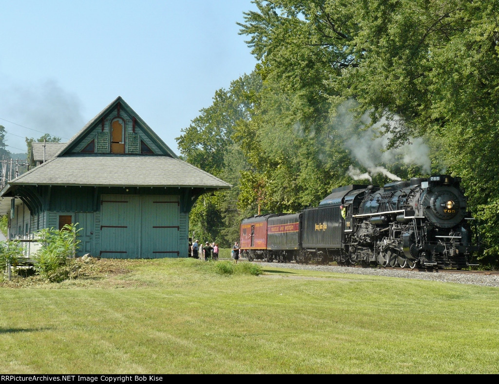 765 glides past the old Portland station