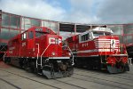 CP Rail Unit and NS 9-1-1 beside each other at Steamtown