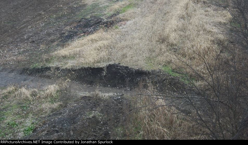 Cut through roadbed on former ROW