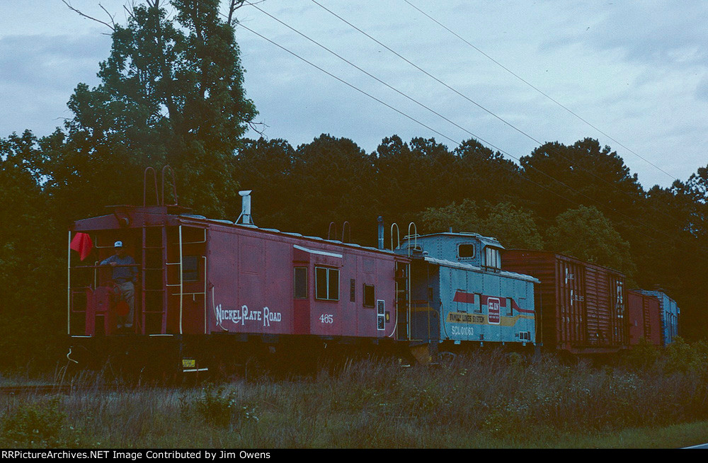 NKP caboose 465 on the rear.