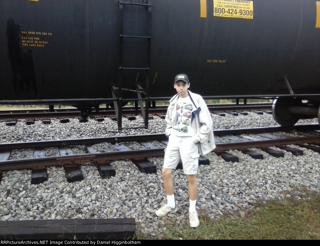 Standing by Tank Car