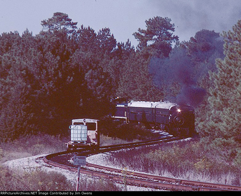 Flagg Coal 75 backing out to Greenbrier, with the motorcar for fire fighting following.