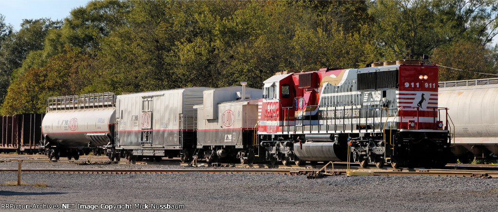 NS #911 shoving the TRANSCAER train to the yard