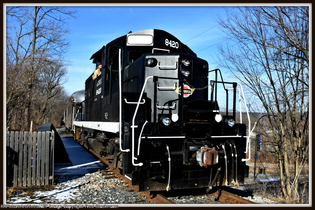The engineer leans into the morning sun.