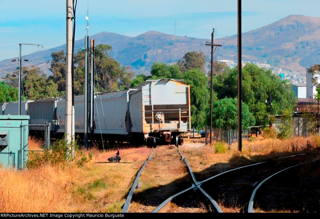 FPAX Covered Hoppers on the side track