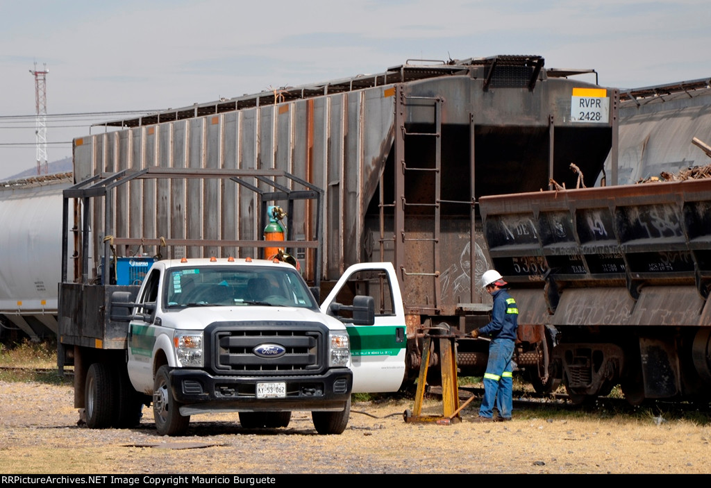 Ferrovalle worker repairing cars