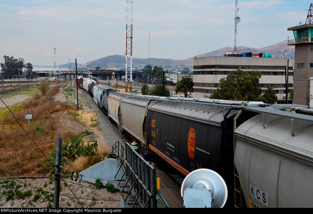 Cars being pushed over the hump