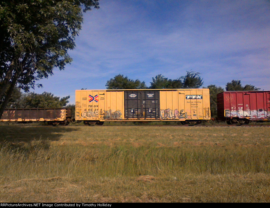 boxcar with mild "art".