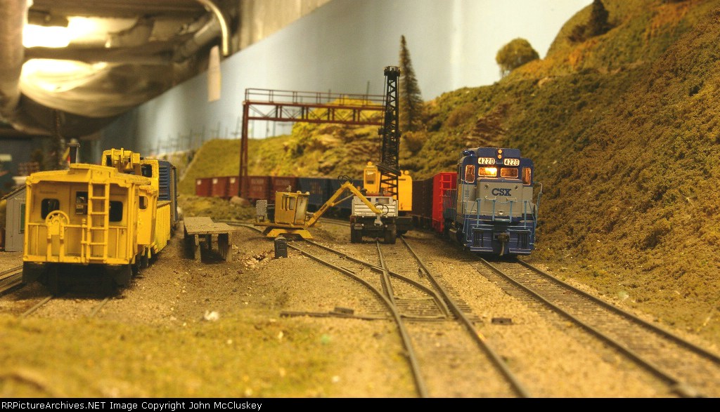 CSX going slow past trackwork area