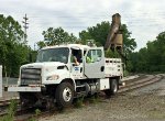 CSX 306111 is ready to back up into the Hill Yard behind the coal tower.