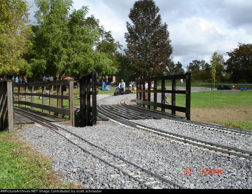 2-6-0 #99 with people in tow