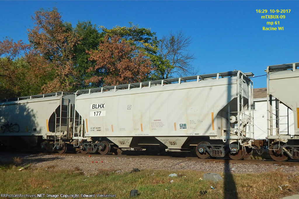 Empty sand hoppers roll north on mTXBUX-09