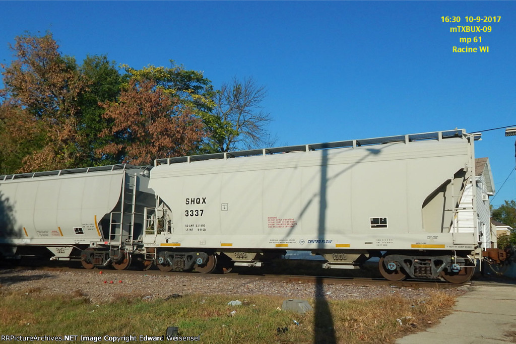 Empty sand hoppers roll north on mTXBUX-09