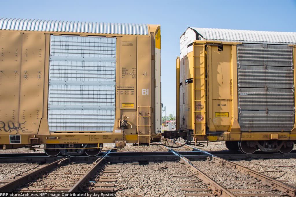 Autoracks pound the UP diamond