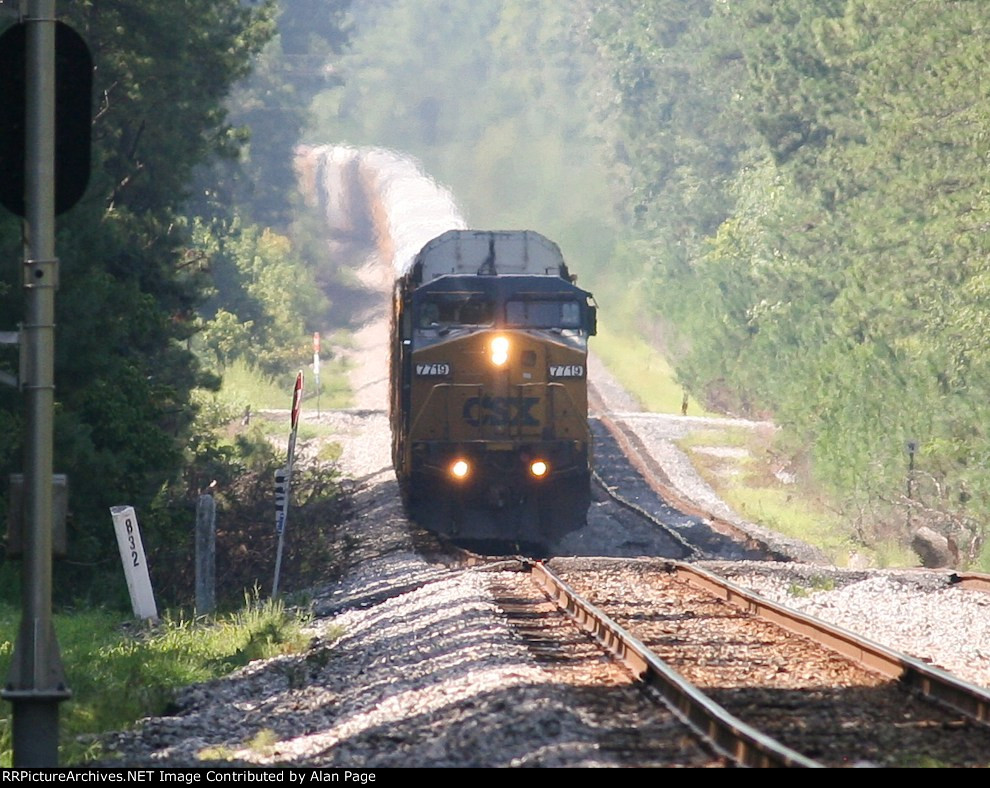 CSX C40-8W's 7718 and 7396 pound up the hill