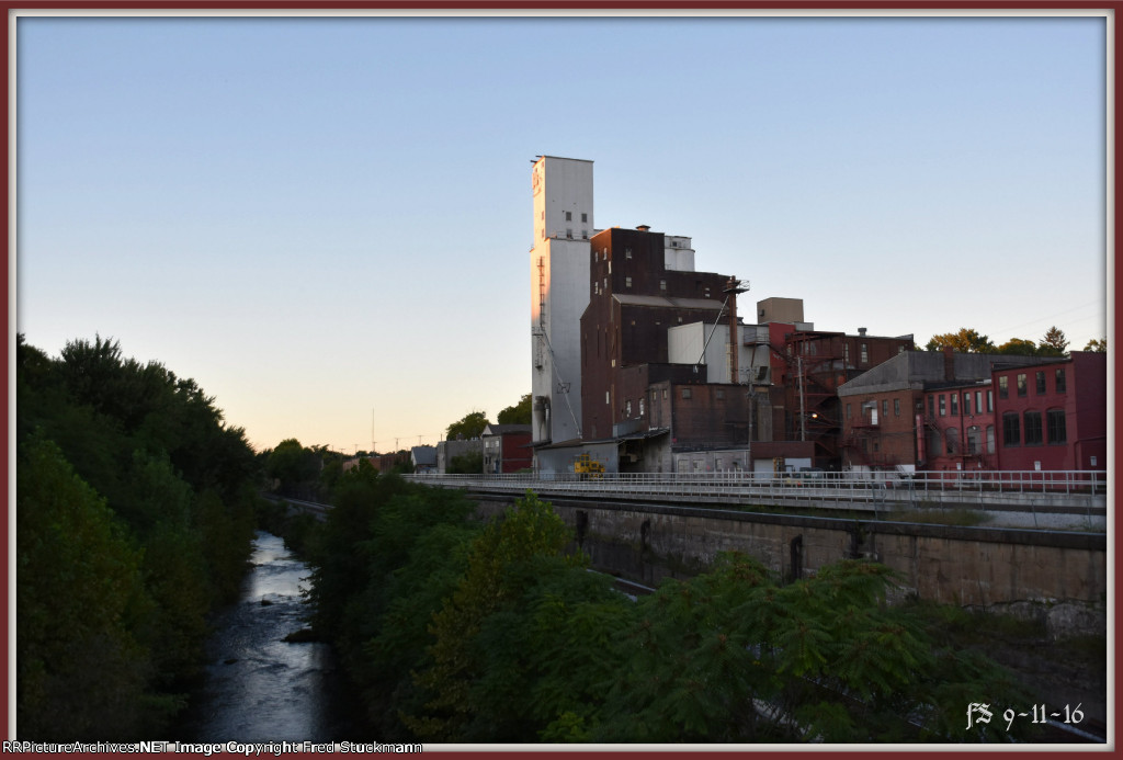 The Cuyahoga River flows by the scene and doesn't know, nor care about what's lost here.