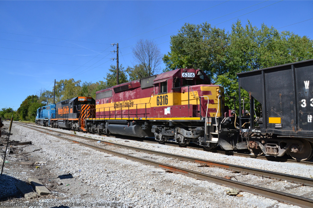 An ex WC unit trails.