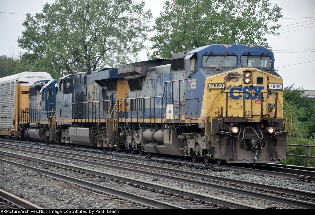 Eastbound vehicle train exits yard
