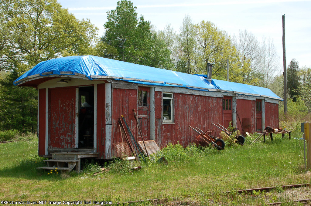 Old baggage car still in use as shed, but moved from downtown to City Point.