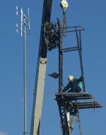 Sparks fly as the second signal head is readied for removal.