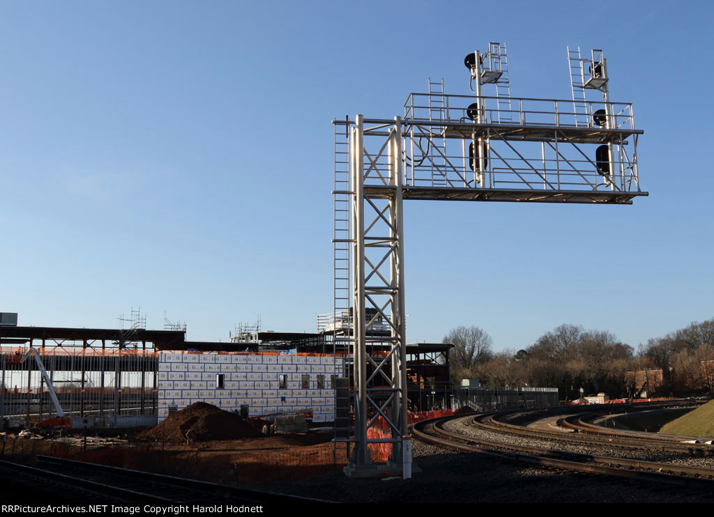 The new station, current cantilever signals and tracks
