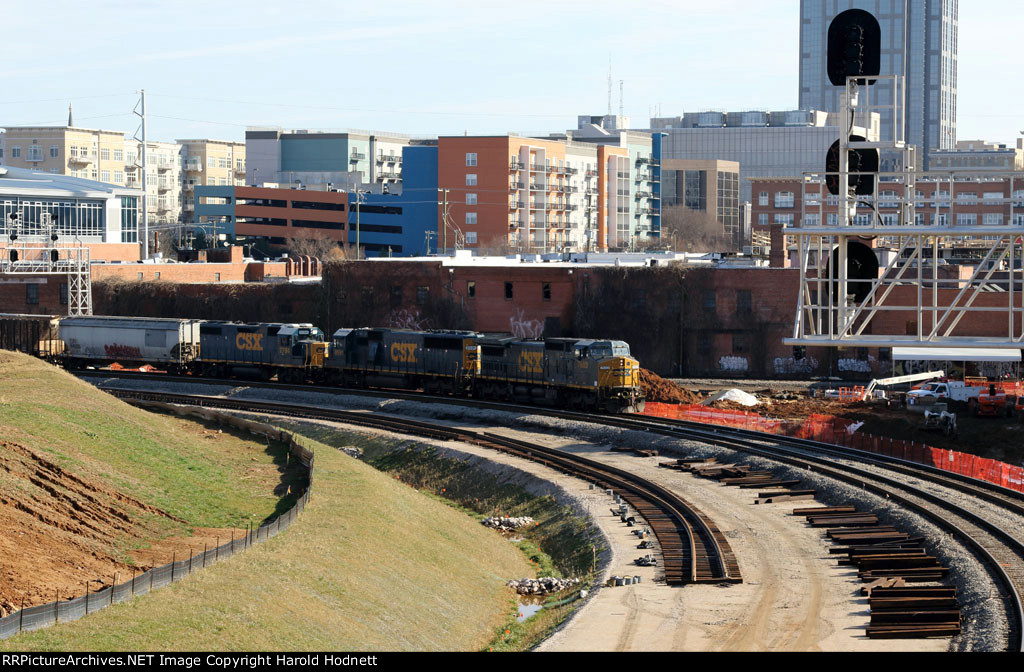 View of CSX train F741 on current track 2 headed south with new tracks in foreground