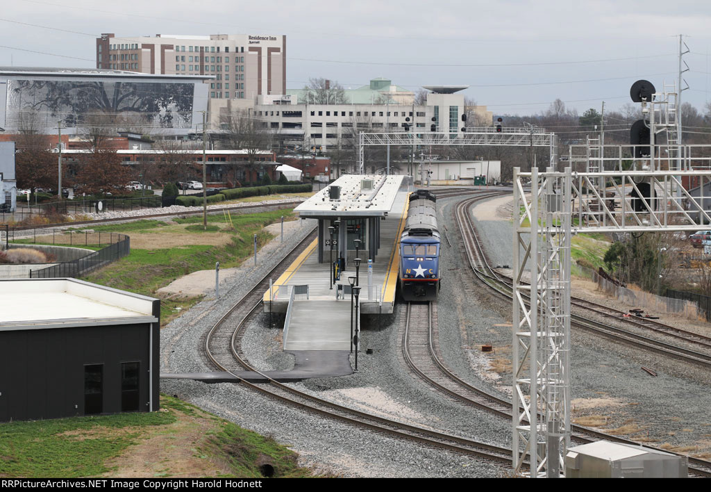 Train 75 is in the station, awaiting the arrival of train 80