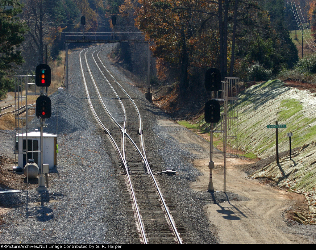 The scene at the "plant" at Smothers.  This control point will no longer exist once all double tracking is complete.  The former north end of this stretch of single track, Green, was discontinued today.