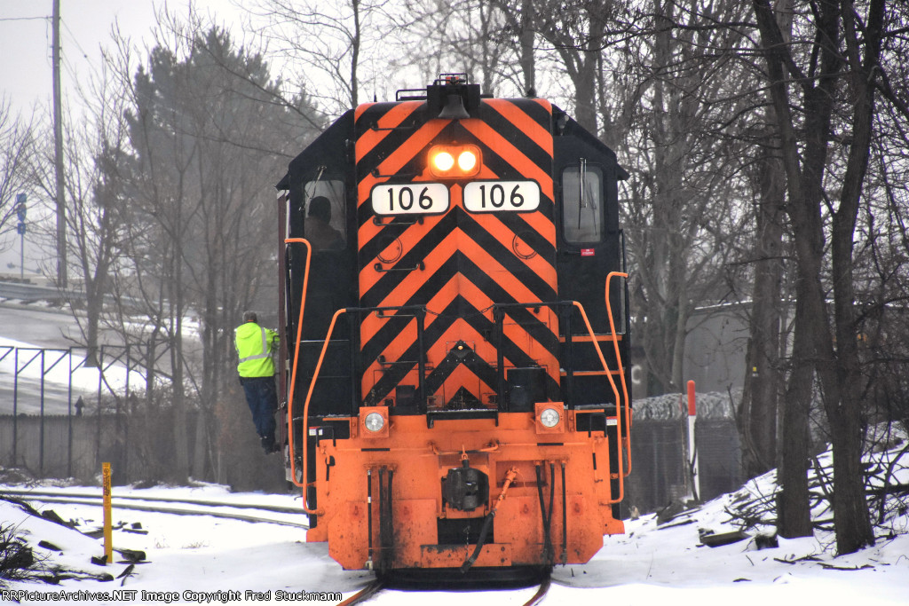 The conductor comes into view.