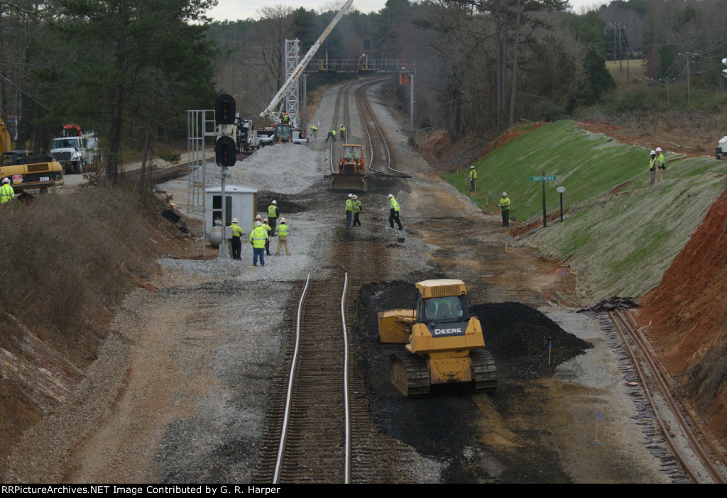 The turnout at CP Smothers is gone and dozer in foreground piles up dirty ballast to be removed