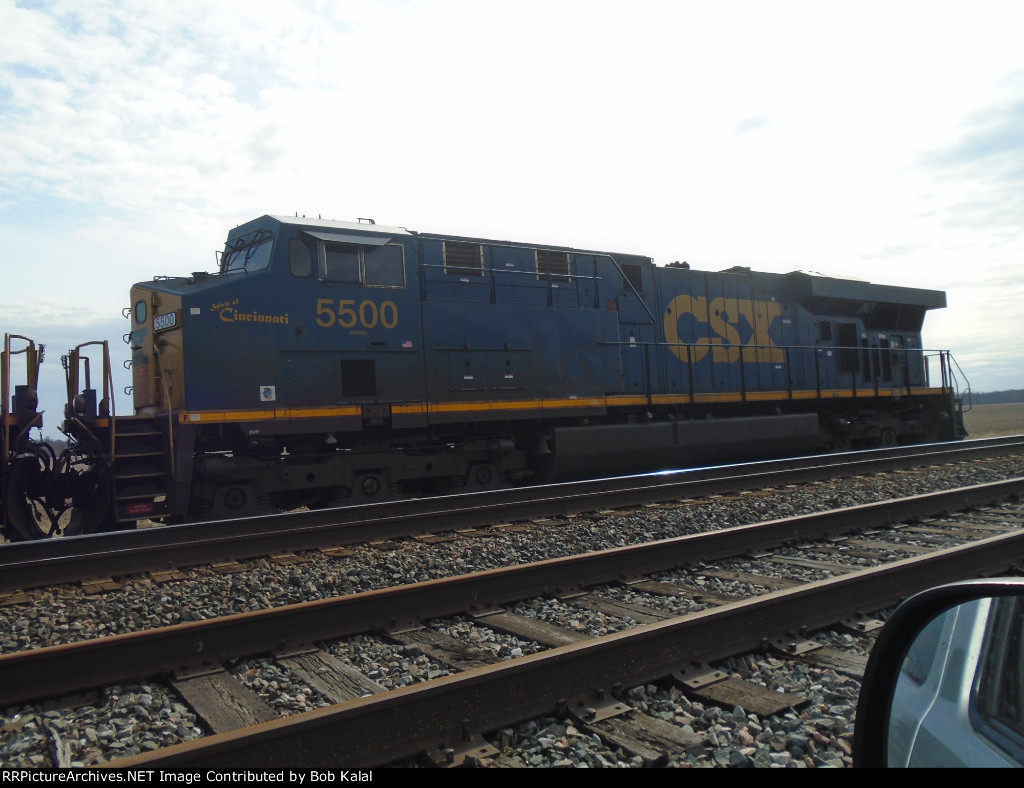 Further west, across N. Coles Street. CSX 5500 waiting
