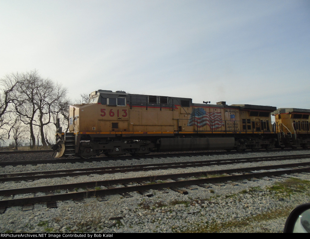 UP 5613 idling at Royal