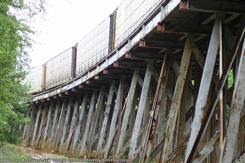 Autoracks on the curved bridge
