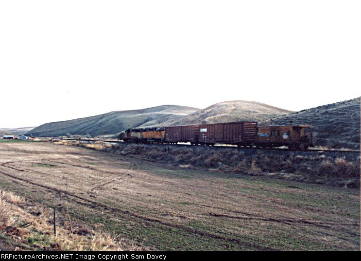 Hepner trun rolling across the flatlands near Ione