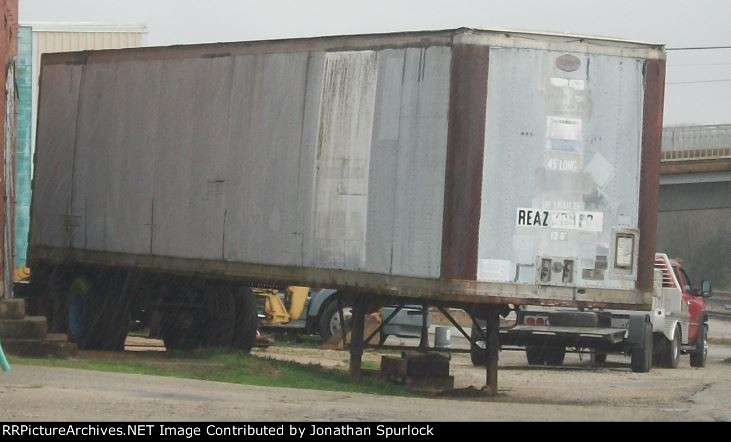 Right side view of REAZ/TransAmerica trailer, at Willow Springs, MO