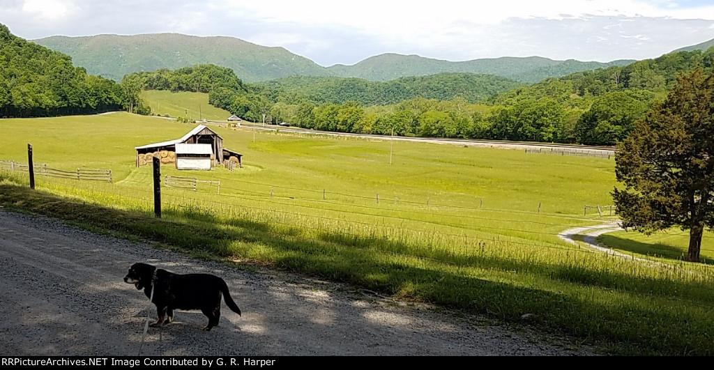 the wait for the RBBX train at Solitude started out sunny, but the bank of clouds seen in the diwtance overspread us